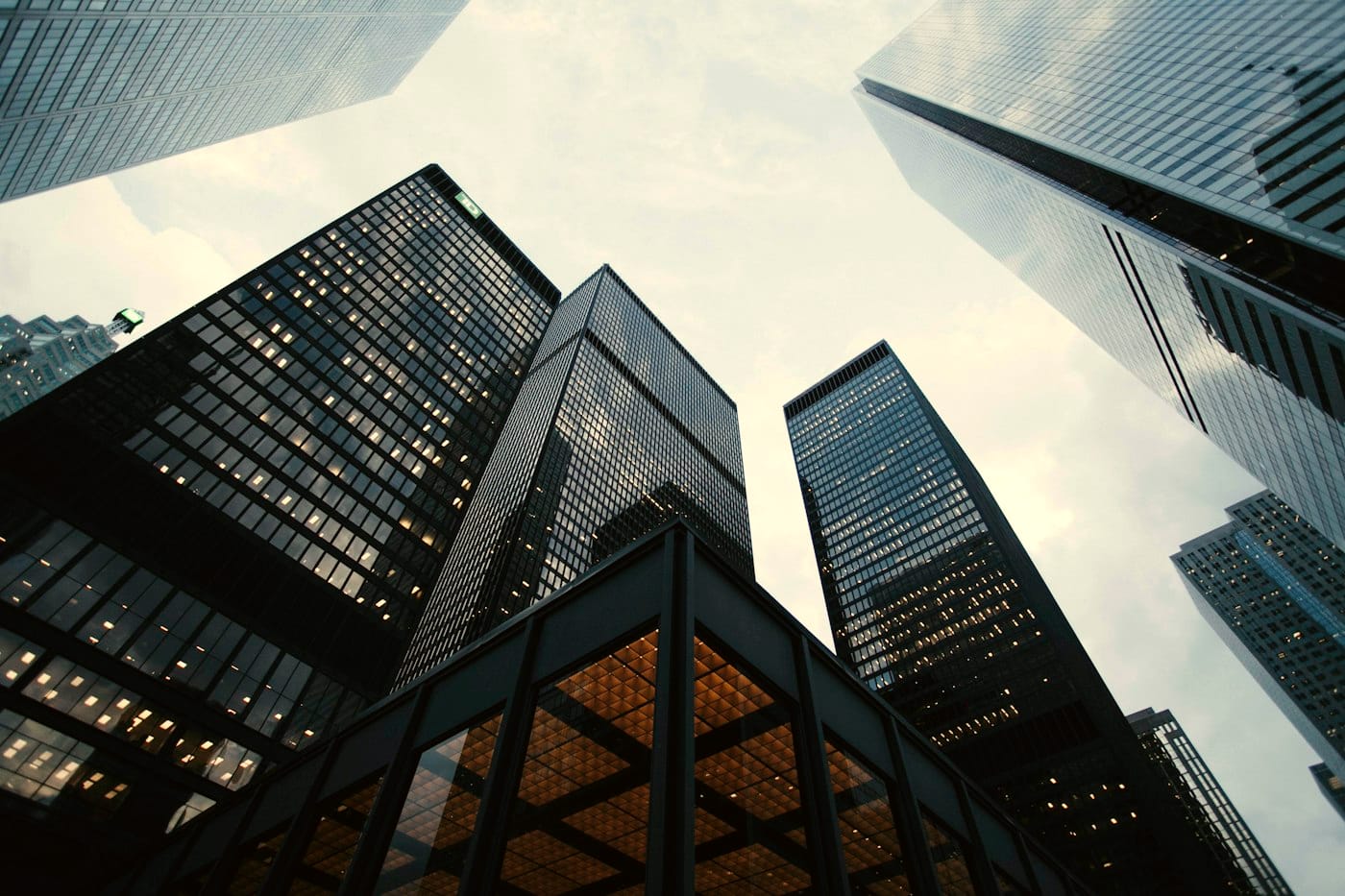Office towers seen from below against the sky